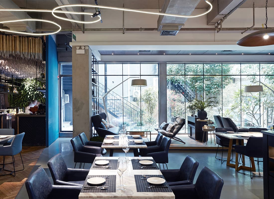 Insurance Solutions - Scenic Photo of the Interior of a Modern Restaurant